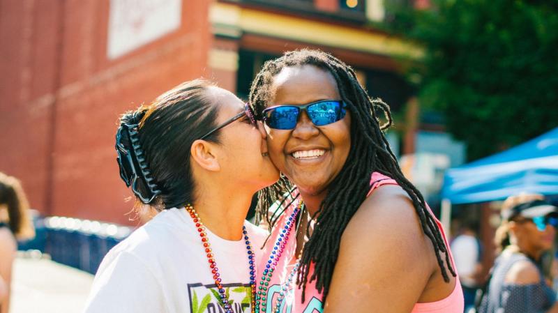 Couple embracing at Tacoma Pride